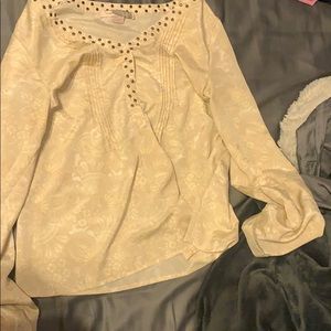 A cream colored blouse